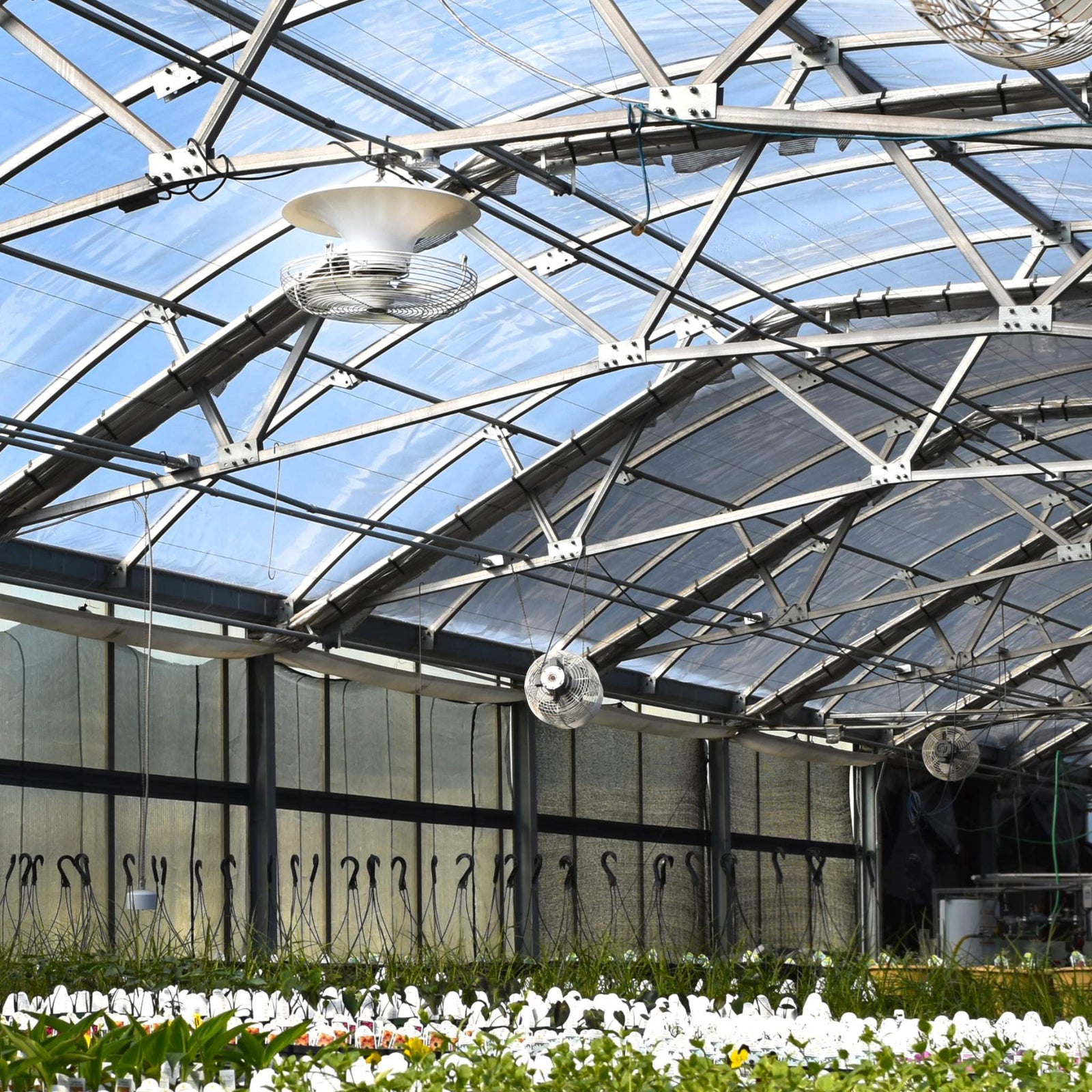 18 in destratifier fan installed in greenhouse