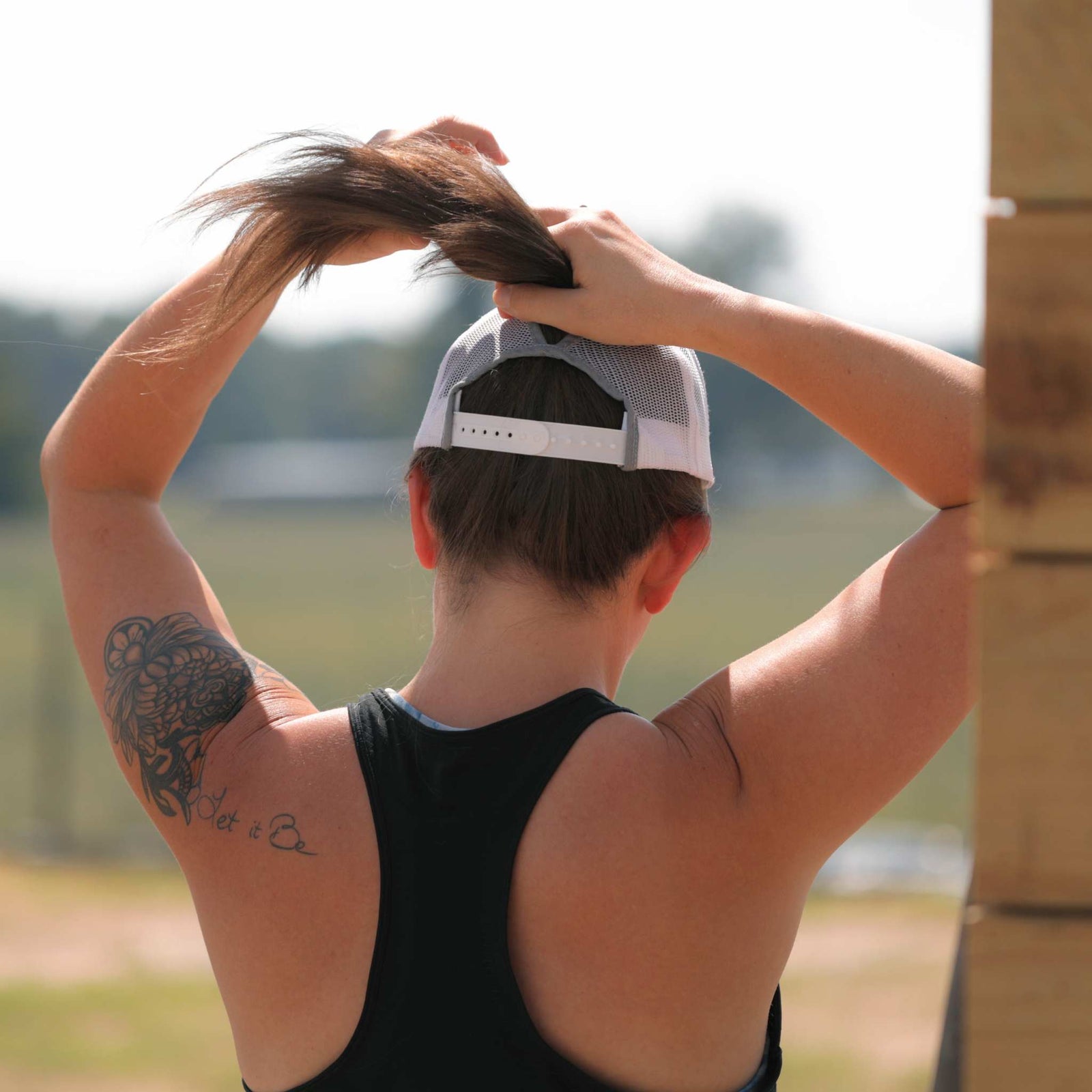 Gray and White Bootstrap Farmer Ponytail Trucker Hat