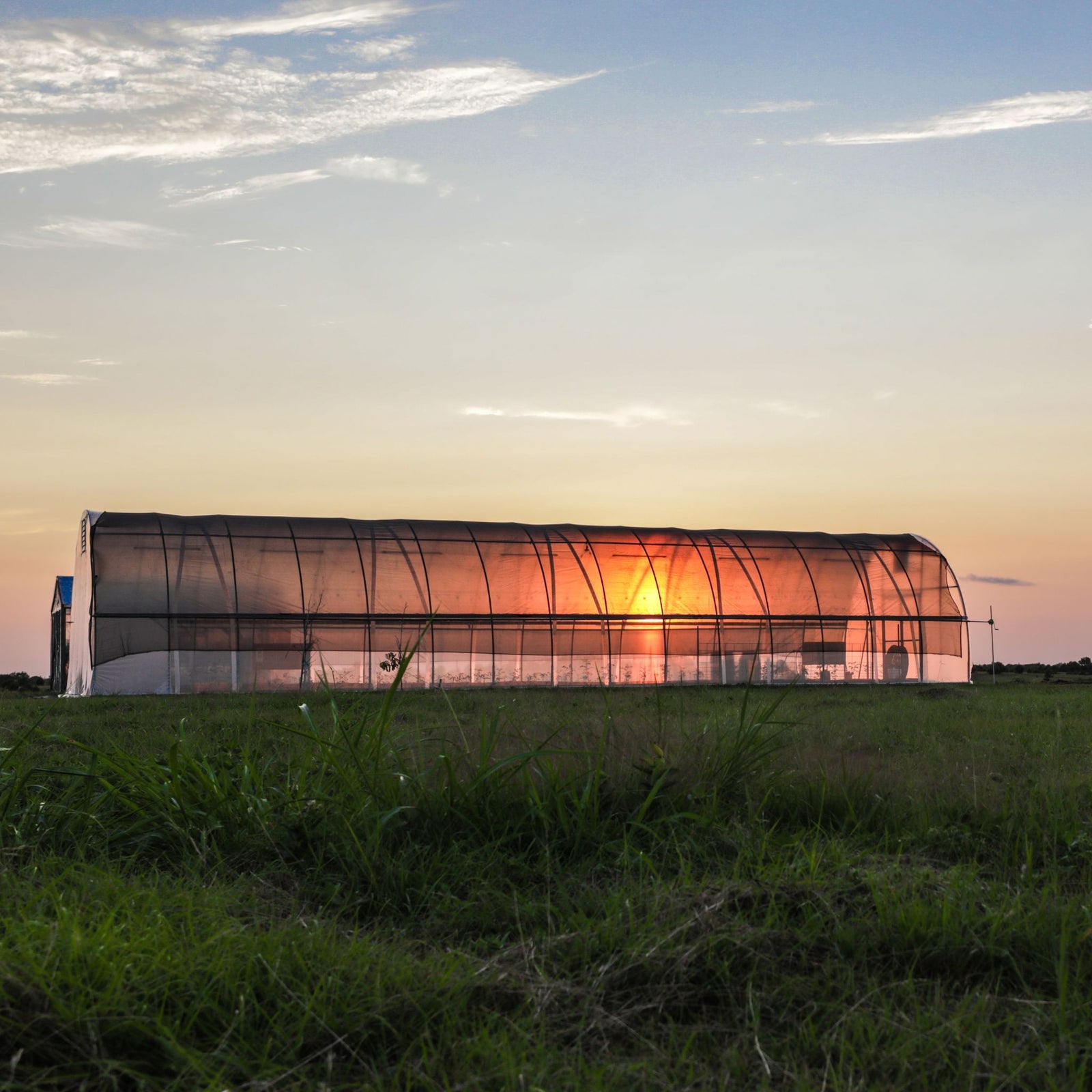 Premium Round All Metal High tunnel with ventilation kit side view