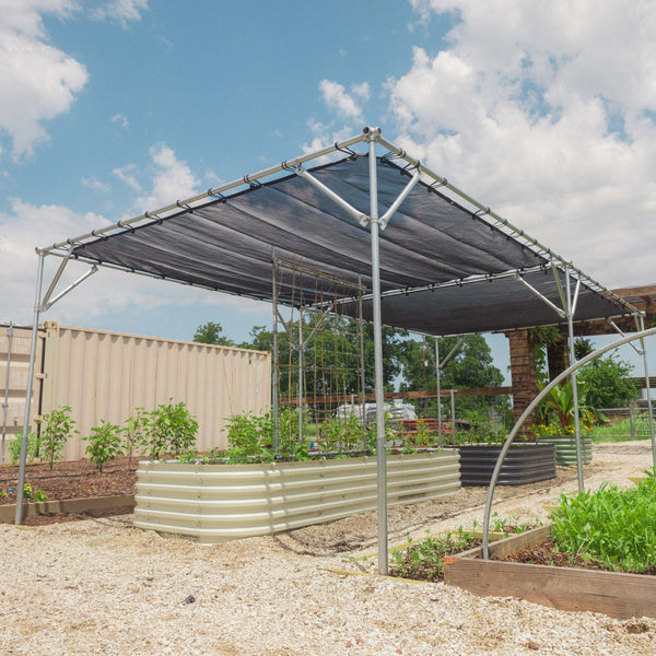 diy shade structure in use on an urban farm
