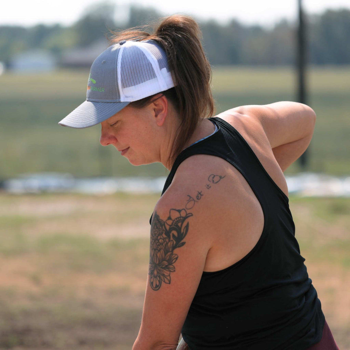 Gray and White Bootstrap Farmer Ponytail Trucker Hat