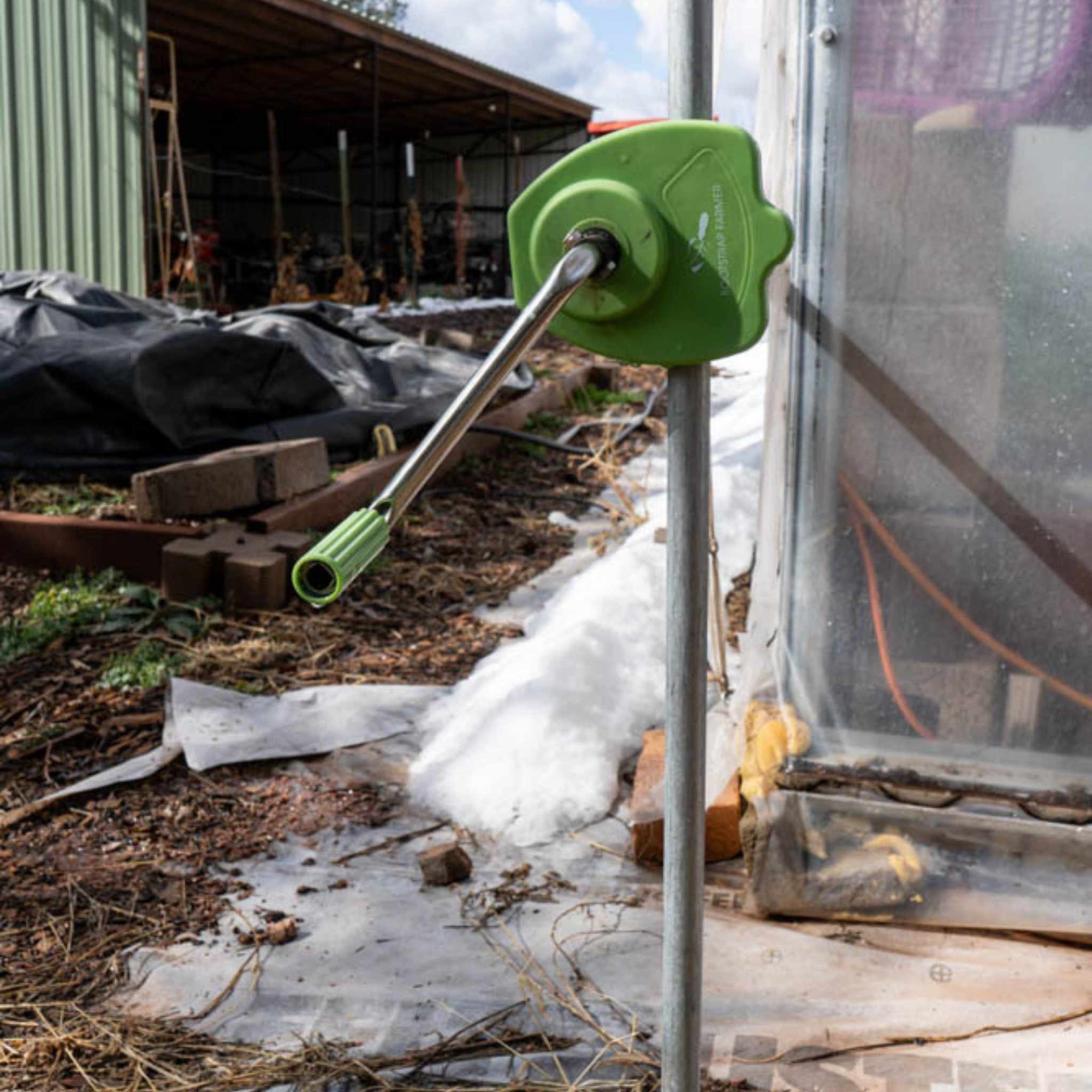 Hand crank for rollup sides on greenhouse