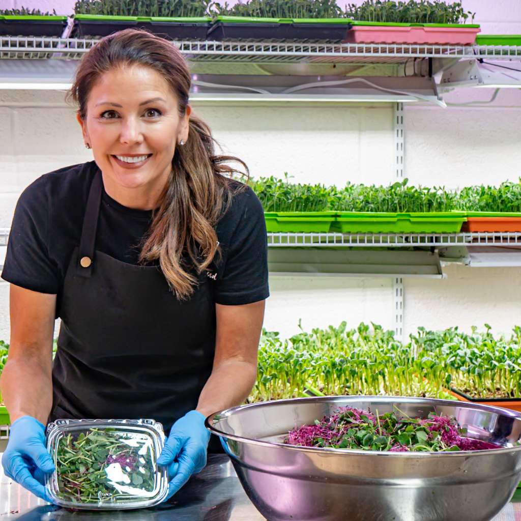 Michelle Microgreens farmer packaging greens