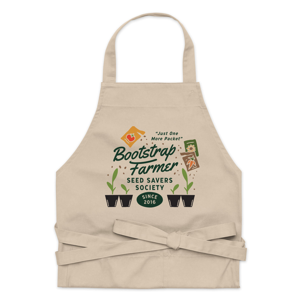Natural rope organic cotton apron laid flat, Seed Savers Society seed-starting design with waist ties