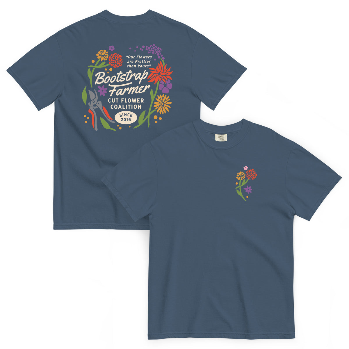 Midnight navy Cut Flower Coalition heavyweight tee, flat-lay showing the chest sprig and large floral back print
