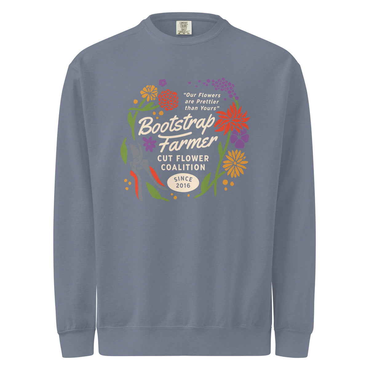 Dusty-blue unisex sweatshirt, front, Bootstrap Farmer Cut Flower Coalition floral wreath and garden shears